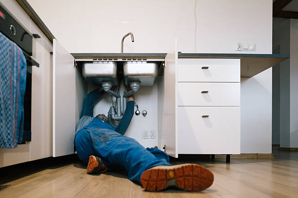 Professional Drain Cleaning technician working in Preston, TX